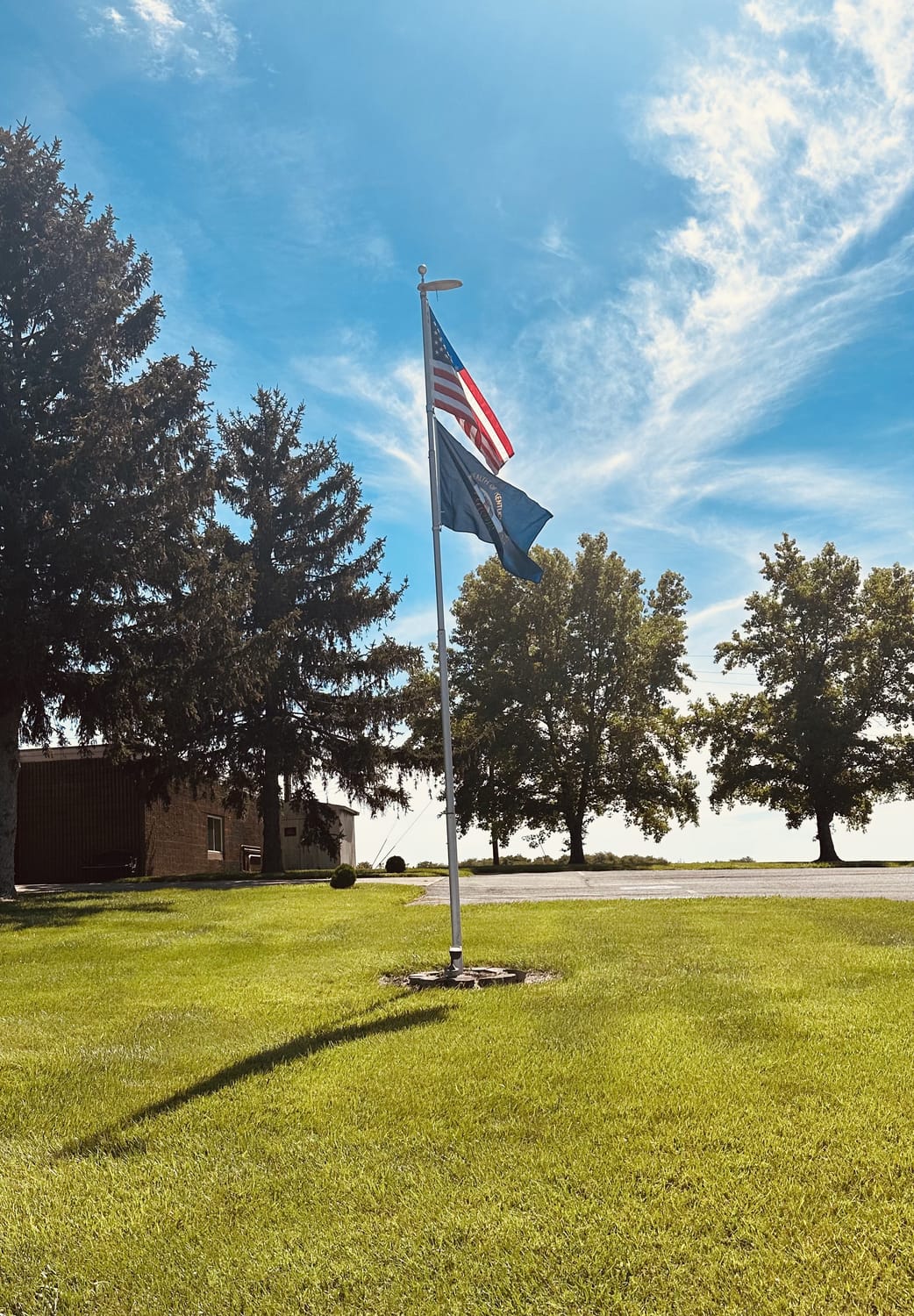 The American and Kentucky flags on the Perkins Country Manor grounds